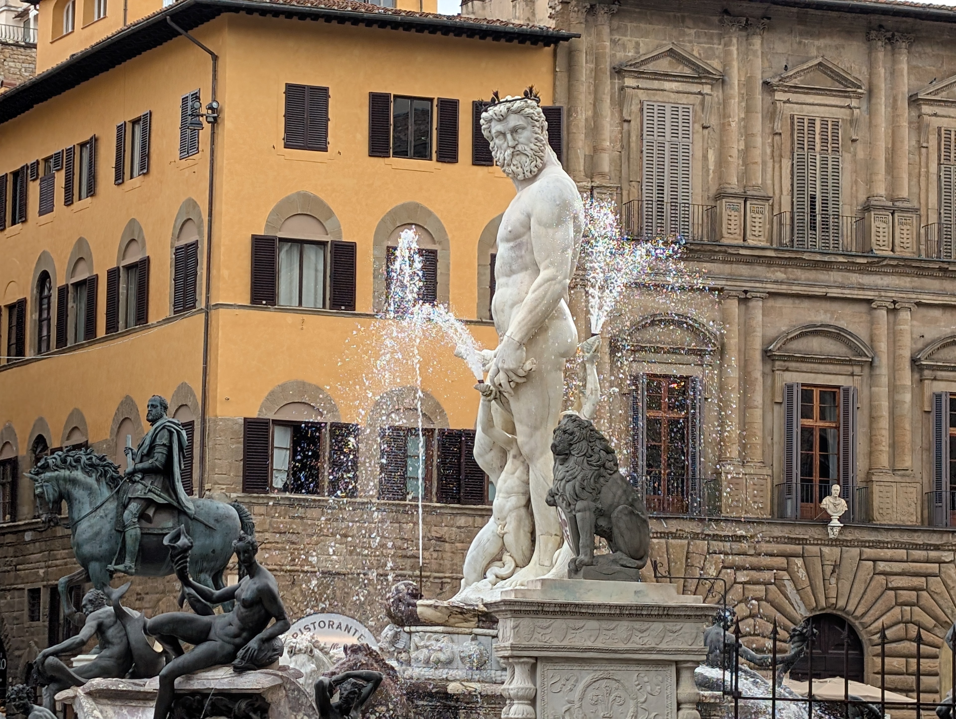 Neptune fountain with marble statues in Piazza della Signoria, Florence