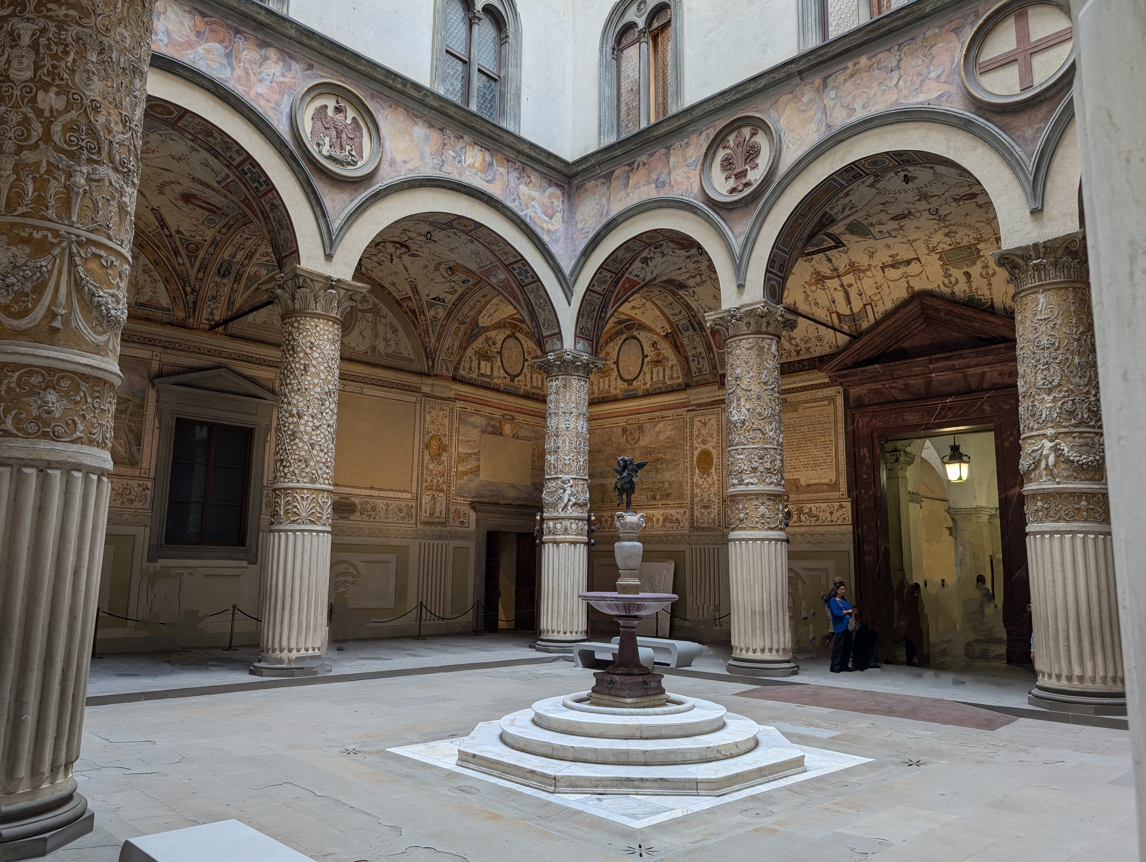 Frescoed Renaissance courtyard with classical columns in Florence