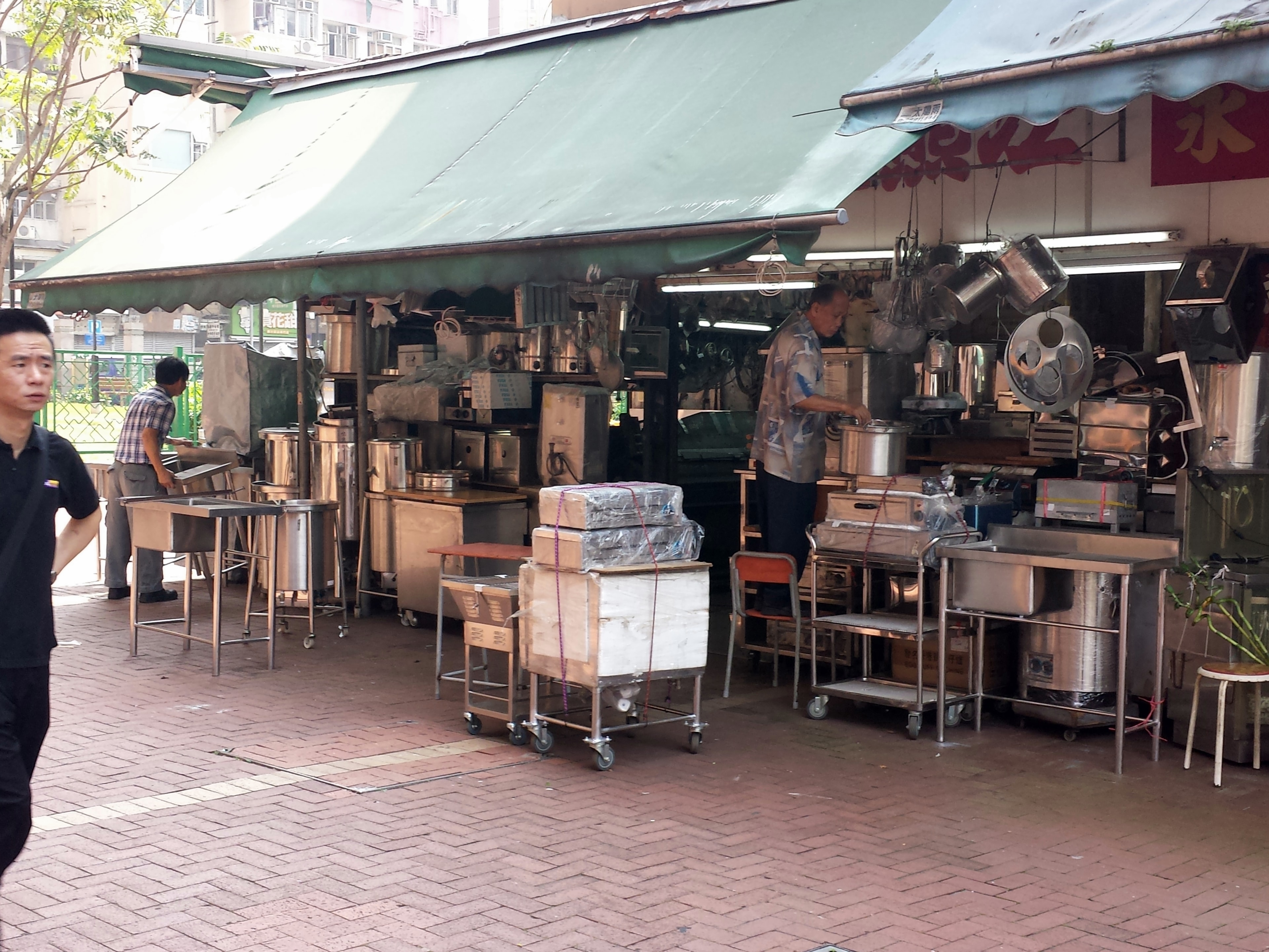 Outdoor stall selling stainless steel kitchen equipment in Hong Kong