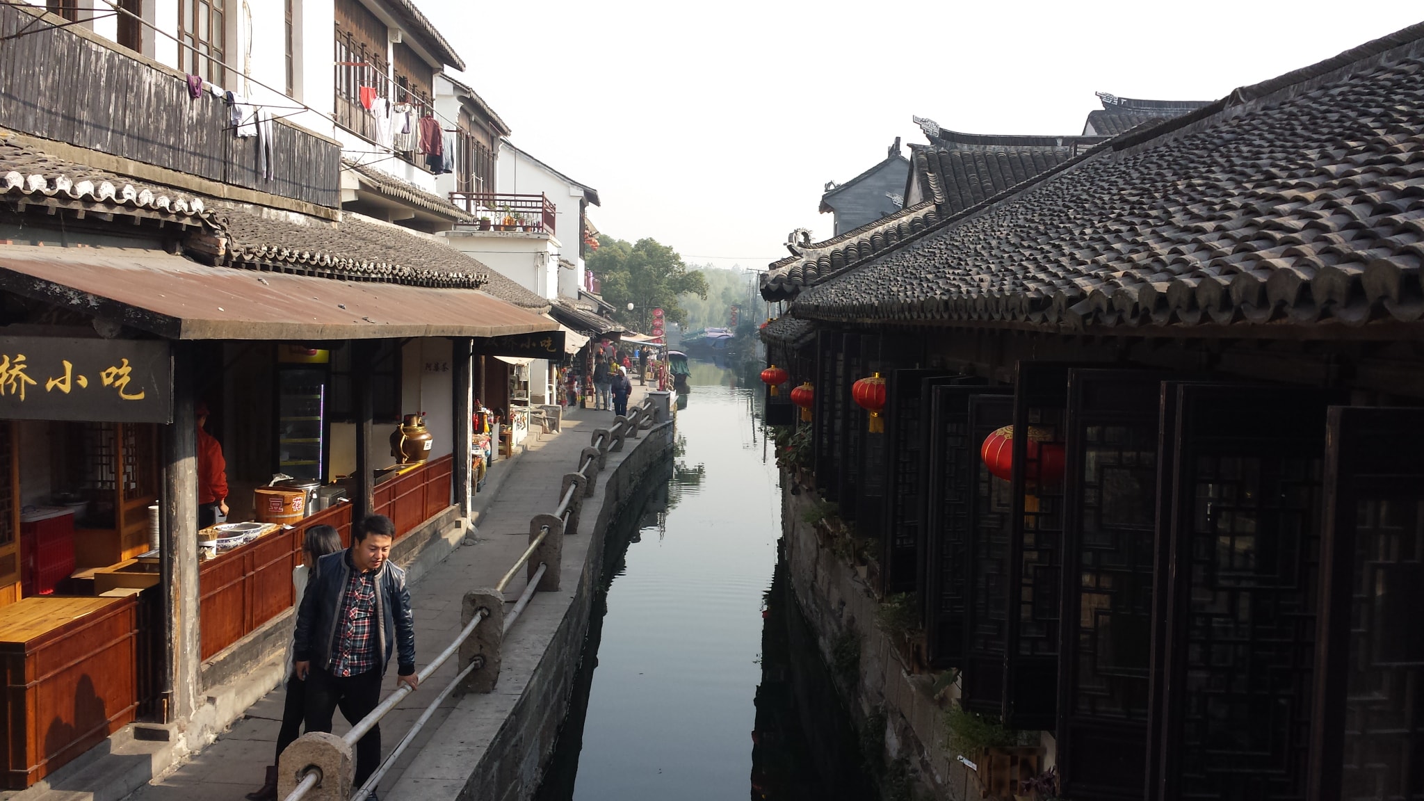 Canal walkway between traditional buildings in Zhouzhuang